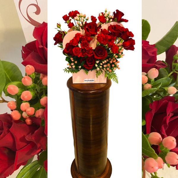picture of roses in heart box on pedestal