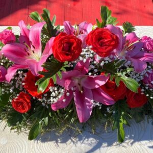 Very pretty red roses and pink large oriental lilies casket spray