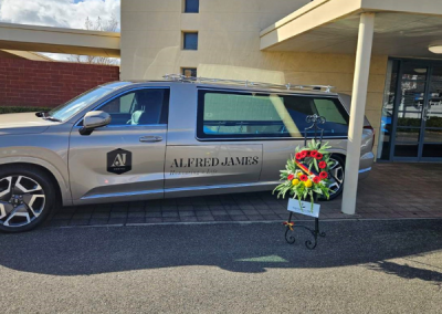 Picture of Crows tribute wreath at front entrace of Alfred James